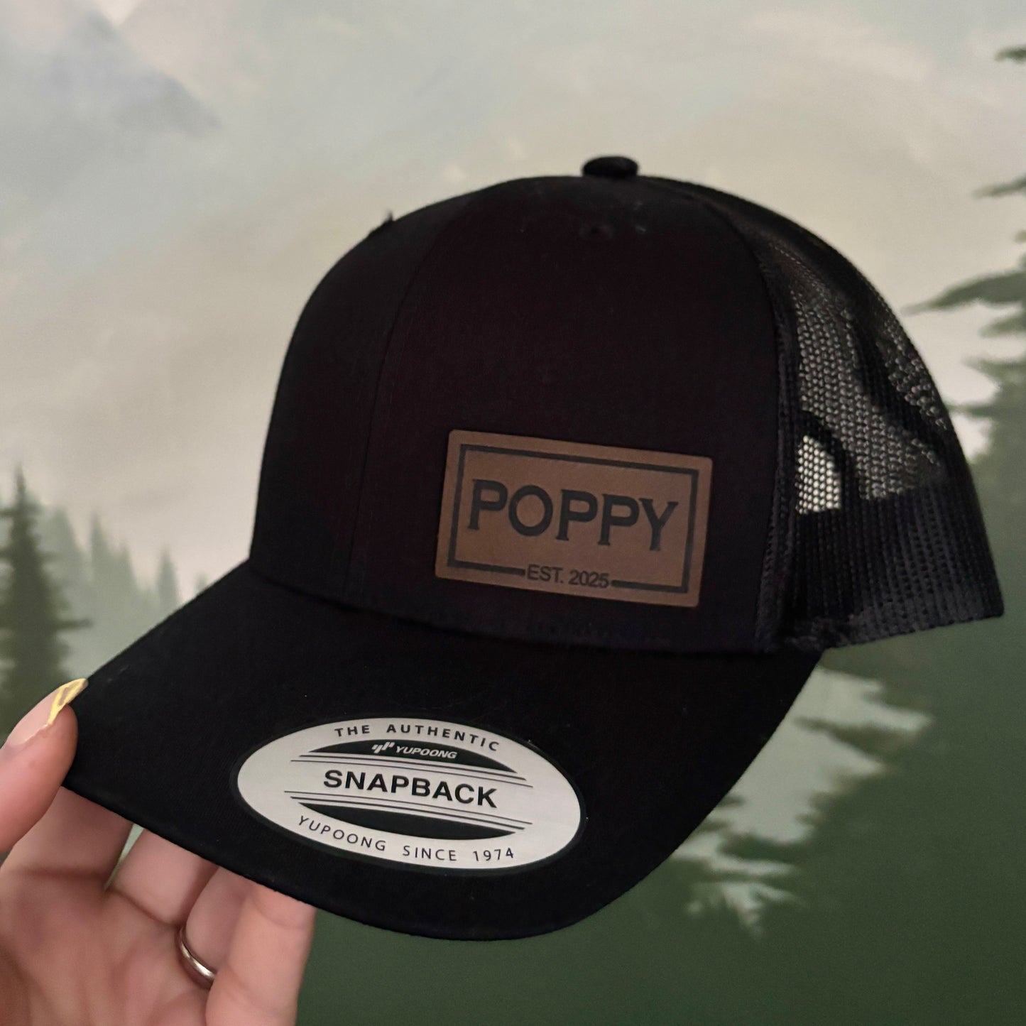 Hat with engraved patch